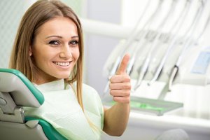 smiling woman at dental office